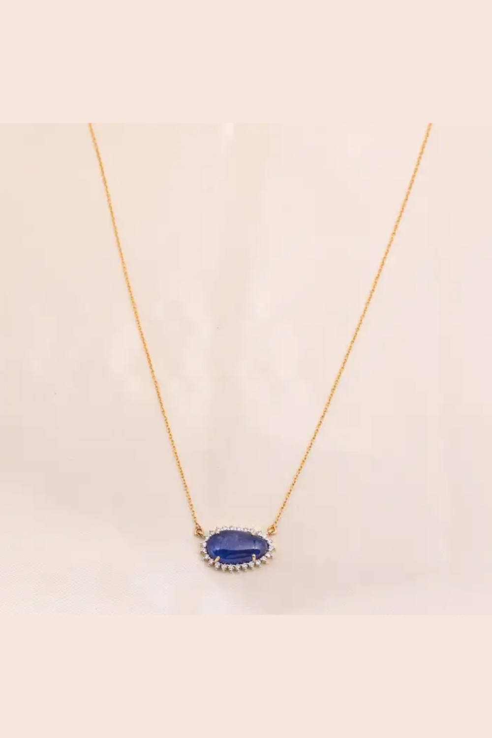 Natural Tanzanite and diamond chain pendant with diamond 0.28 cts in 14k gold