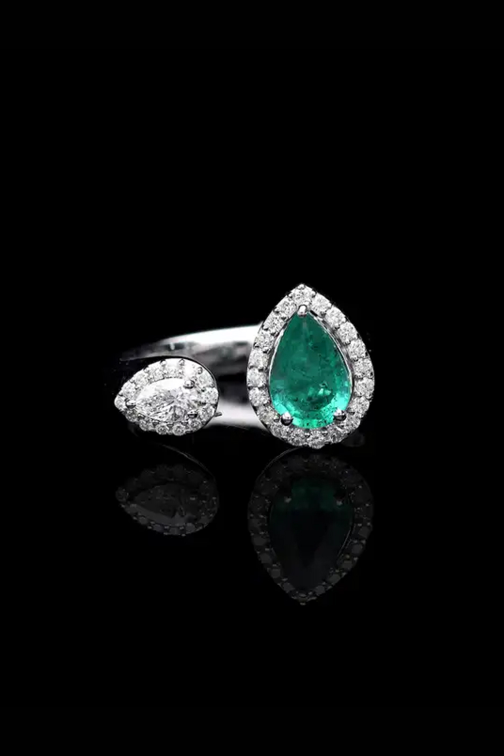 Natural Emerald ring with diamond 0.58 cts in 18k gold